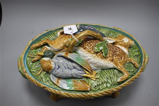 A Mintons majolica game tureen, with hare and poultry lid and oak leaf base, impressed marks, 36cm